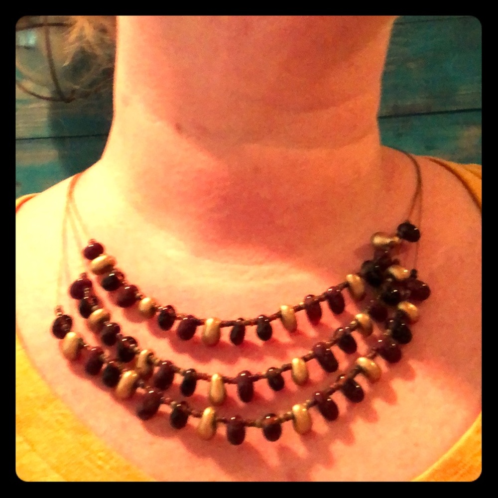 Three strand beaded necklace